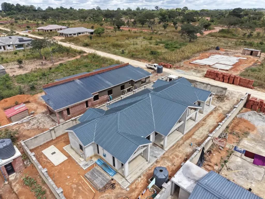 Aerial view of a completed Hongline house with a new grey roof